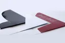 Black, white and burgundy folders with diagonal cuts