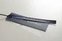 Layered hang tags with gold foil text and black string