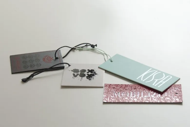 Set of hang tags with spot UV varnish, patterns and strings