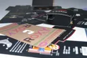 Several printed cardboard displays and POS pieces