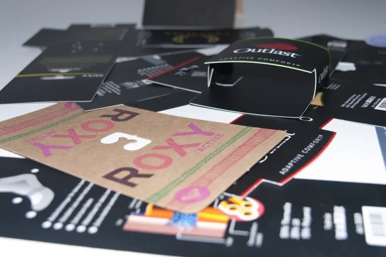 Several printed cardboard displays and POS pieces